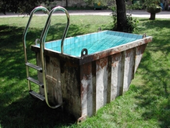 An old dumpster converted into a pool