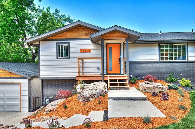 Home with nice curb appeal and orange accent color