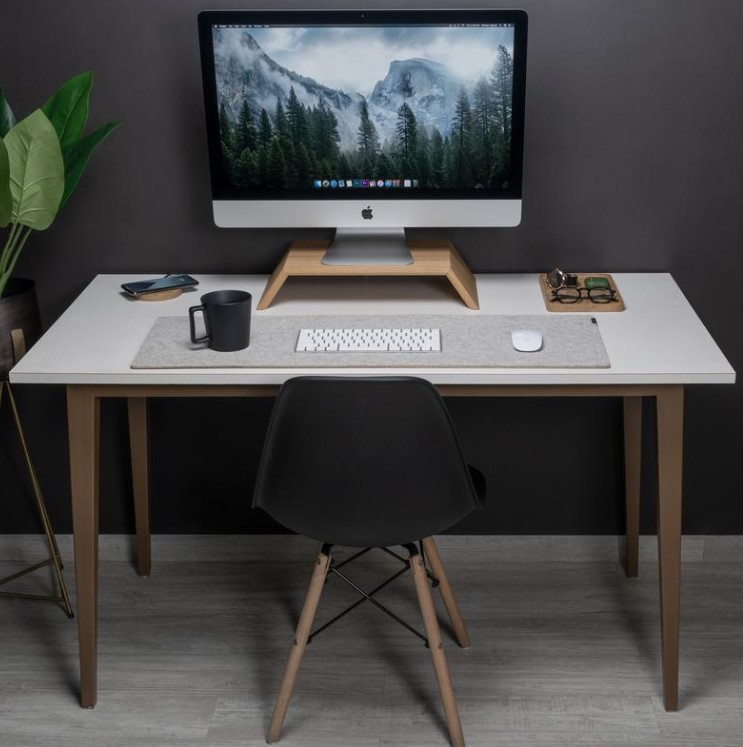 Laptop on desk with cork desk mat