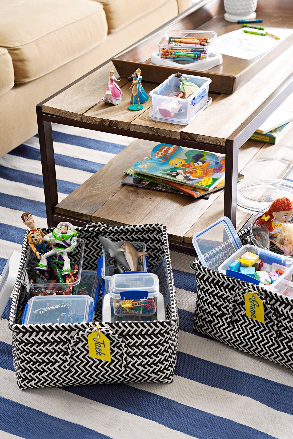 Organized baby-safe living room with toys stored in labeled basket