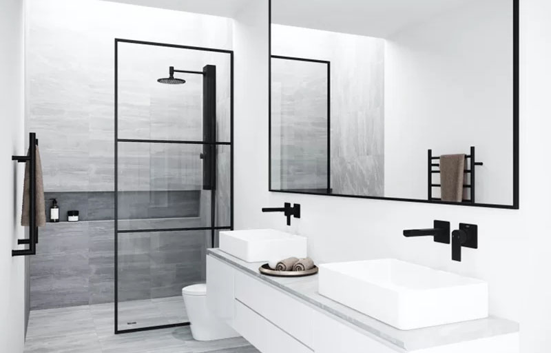 Doorless shower with white and black accents in bathroom
