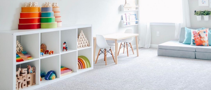 children's cubbies located in kids bedroom for toy storage