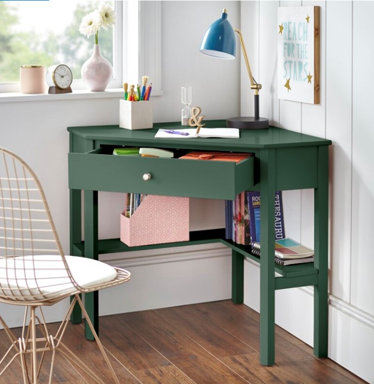 Green Suri corner desk with chair and pens