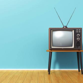 vintage-tv-against-blue-wall