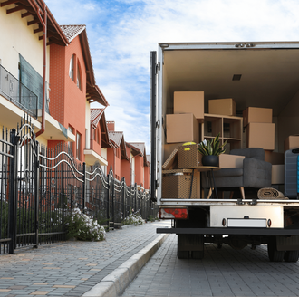 Cross-country moving truck on the road representing an 8-week moving timeline