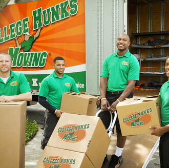 College Hunks Movers outside moving truck.