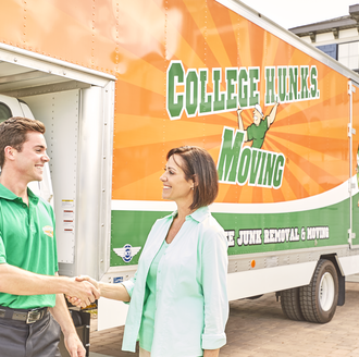 College Hunks employee shaking hands with a client