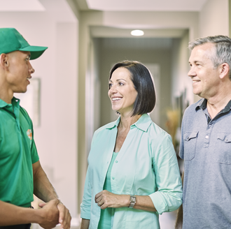 College Hunks employee with two clients