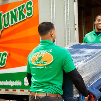 College HUNKS movers working 