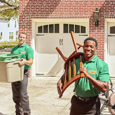 two college hunks moving household items