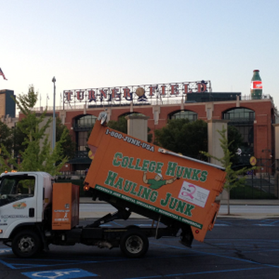 College HUNKS junk truck in front of the old Turner Field in Atlanta