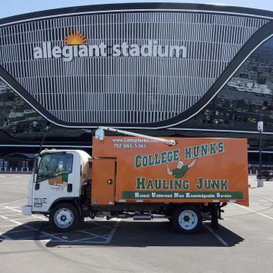 College Hunks junk removal truck parked at Allegiant Stadium