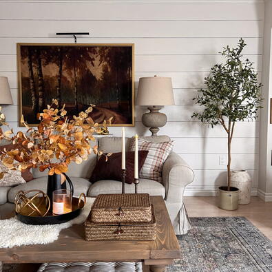 Cozy fall living room with warm tones and autumn décor