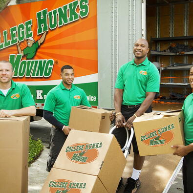 College Hunks Movers outside moving truck.