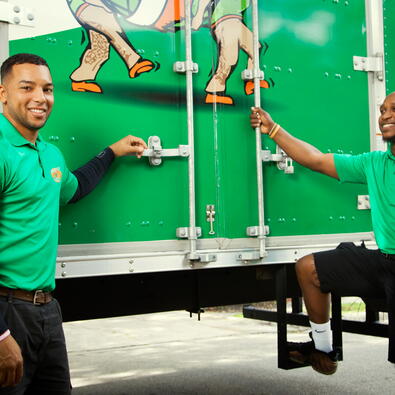 College Hunks employees opening a moving truck