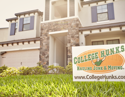 College Hunks Sign In Front of a Home