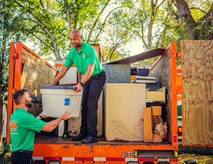 college hunks hauling junk backyard waste removal