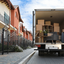 Cross-country moving truck on the road representing an 8-week moving timeline