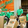 College Hunks Movers outside moving truck.